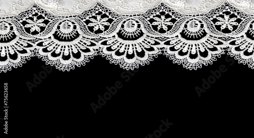 white lace on black background