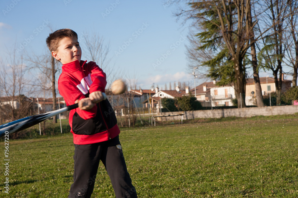 child with red plush that plays baseball
