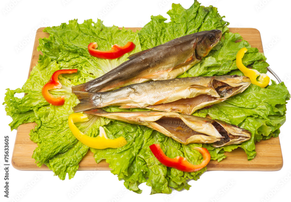 smoked fish with salad and pepper on chopping board smoked fish with salad and pepper on chopping board