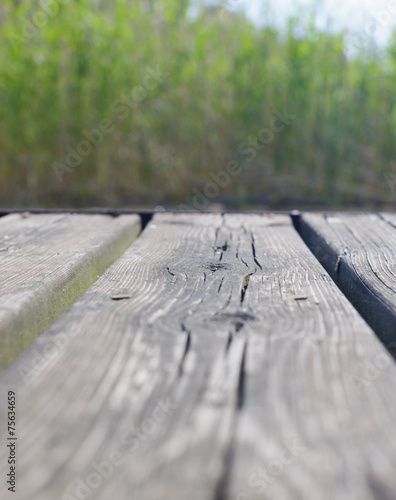 Wooden jetty closeup, selective focus
