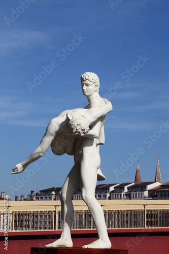 Statues along Saone river in Lyon, France photo