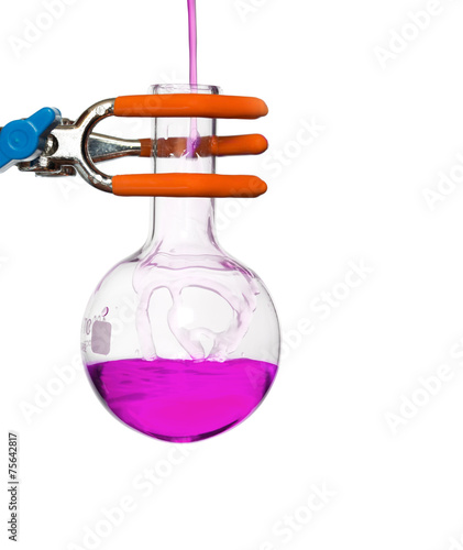 Chemical round bottom flask on a stand with solution photo