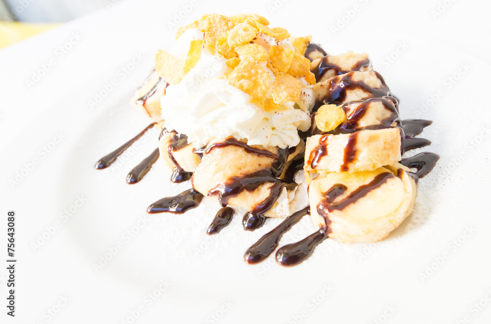 banana crepe cake with chocolate sauce close-up banana crepe cake with chocolate sauce close-up