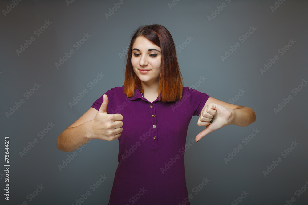 Girl 20 years of European appearance haired showing thumbs up si Girl 20 years of European appearance haired showing thumbs up si