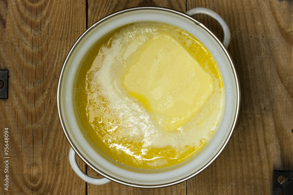 Clarified butter in pot Clarified butter in pot