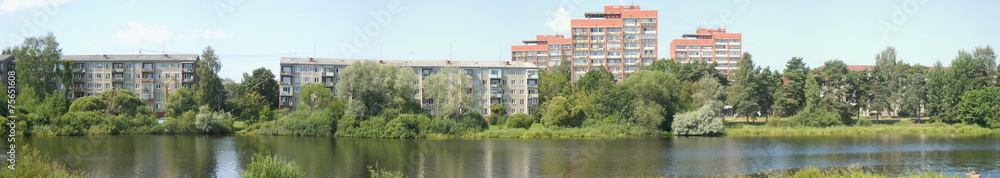Panoramic cityscape with lake