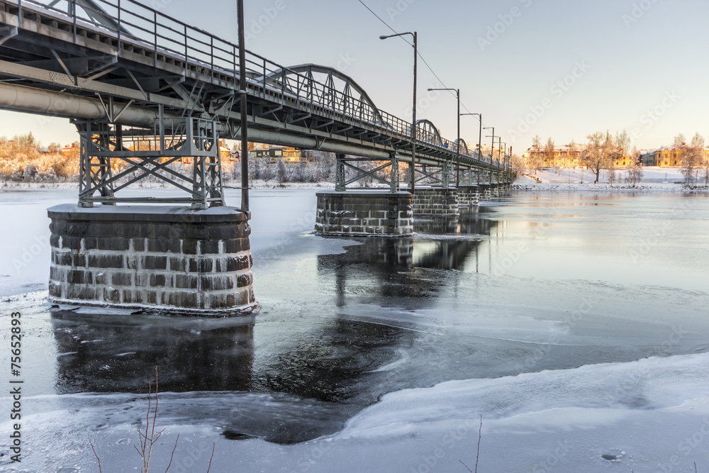 Bridge over Frozen River in Umea, Sweden