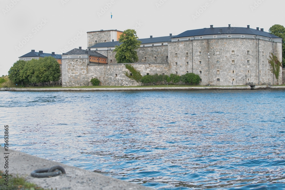 Vaxholm castle with ocean and mooring place. Stockholm, Sweden. 