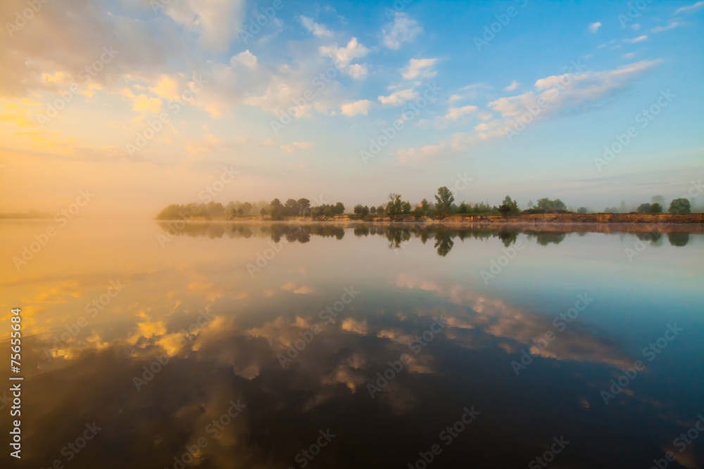 Clouds reflecting in the lake, Ukraine.