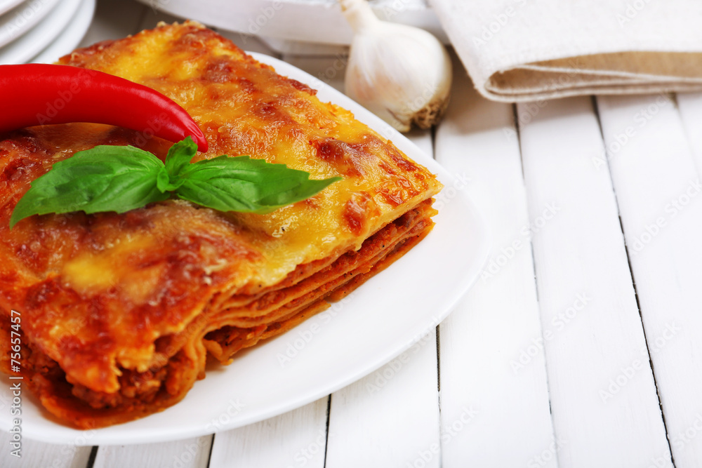 Portion of tasty lasagna on table Portion of tasty lasagna on table