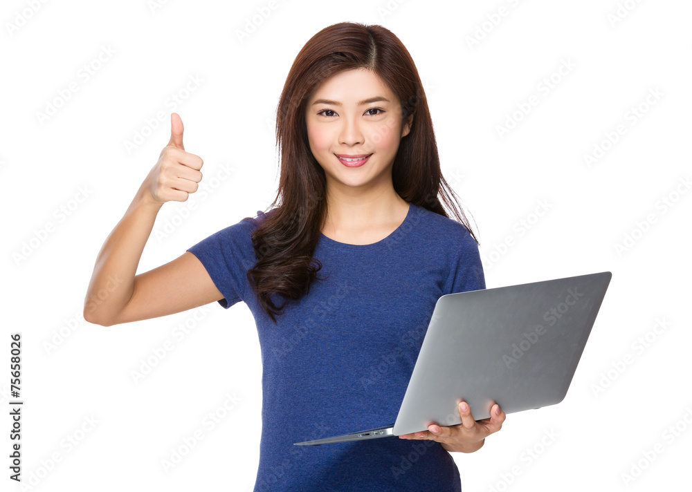 Woman use of laptop and thumb up Woman use of laptop and thumb up
