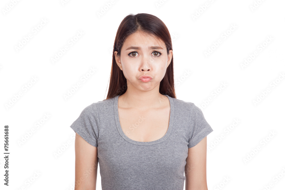 Young Asian woman is in bad mood Young Asian woman is in bad mood