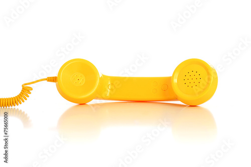 Yellow phone isolated over white background