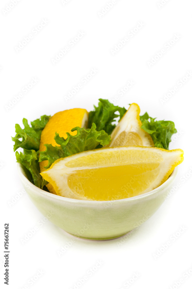 Sliced lemon on white background. Selective focus. Sliced lemon on white background. Selective focus.