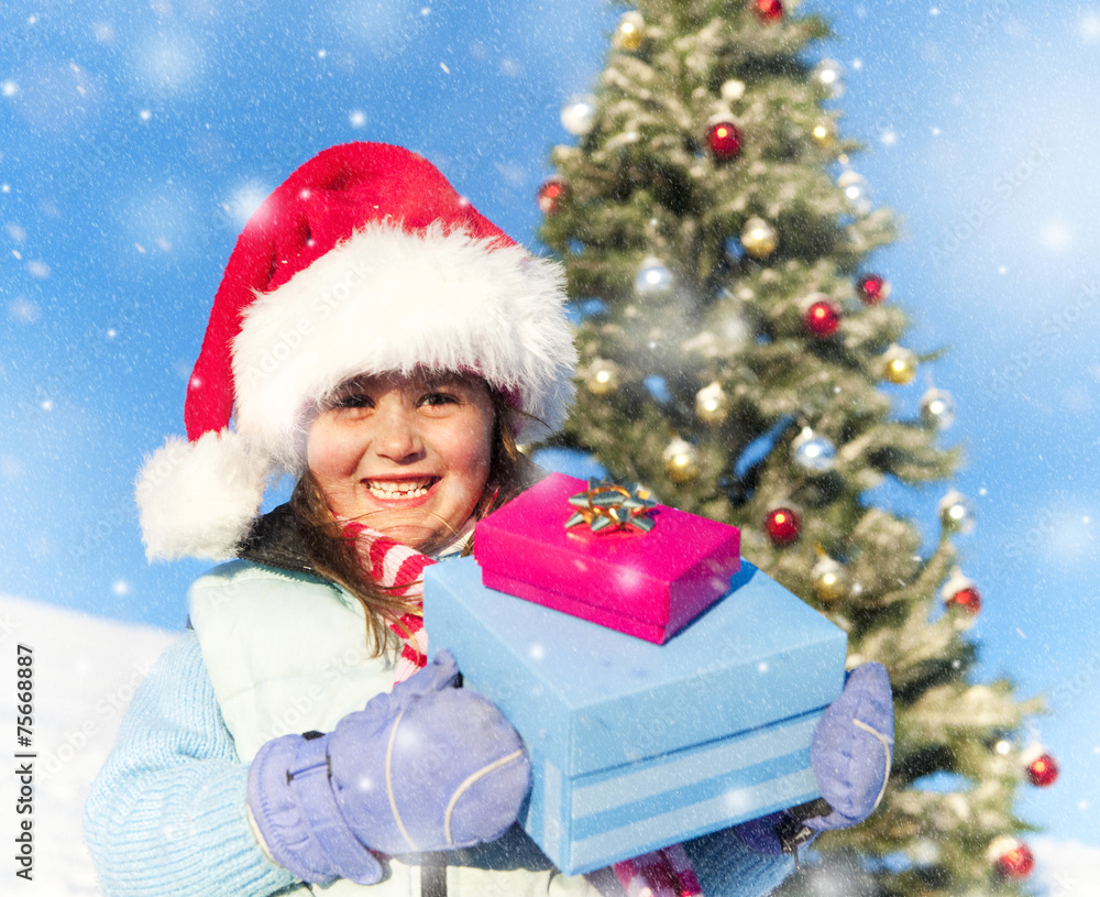 Happy Little Girl Posing Outdoors With Her Present Happy Little Girl Posing Outdoors With Her Present