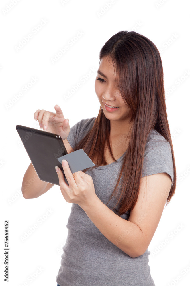 Young Asian woman with blank card and tablet PC Young Asian woman with blank card and tablet PC