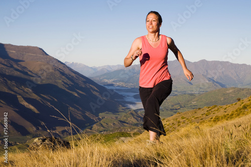 Young Woman Jogging Wilderness Mountain Concept