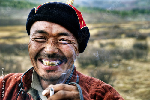 Mongolian Man Smoking photo