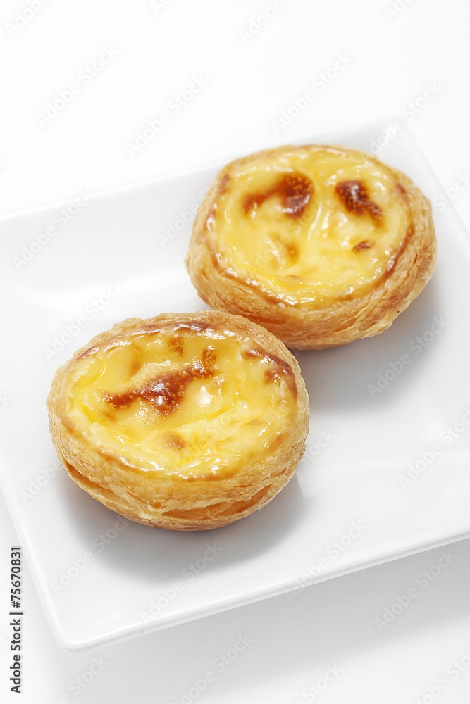 Egg tart on plate Egg tart on plate