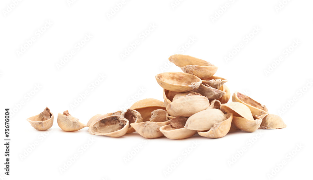 Pile of multiple pistachio shells isolated Pile of multiple pistachio shells isolated