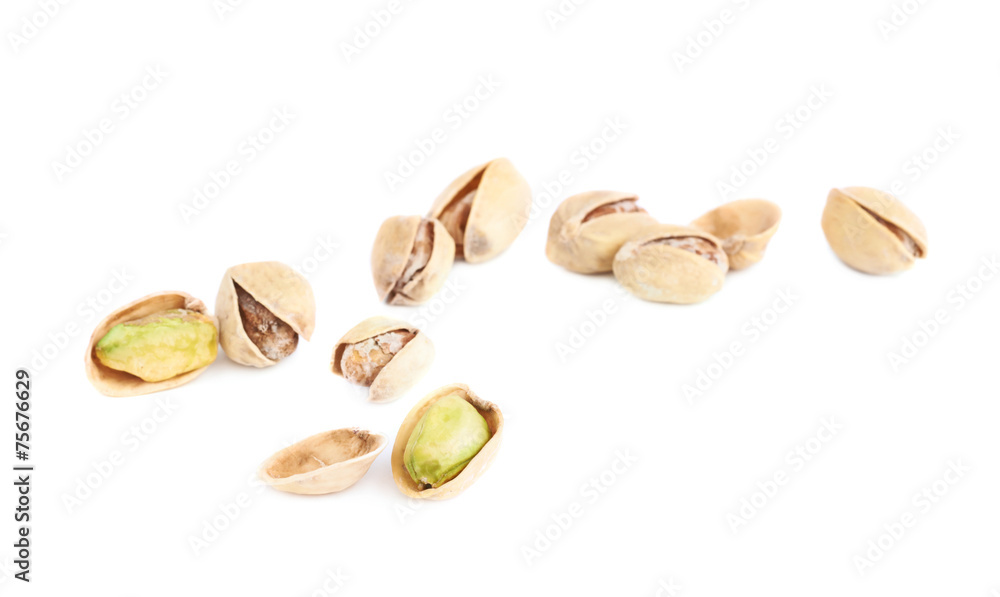 Pile of multiple pistachios isolated