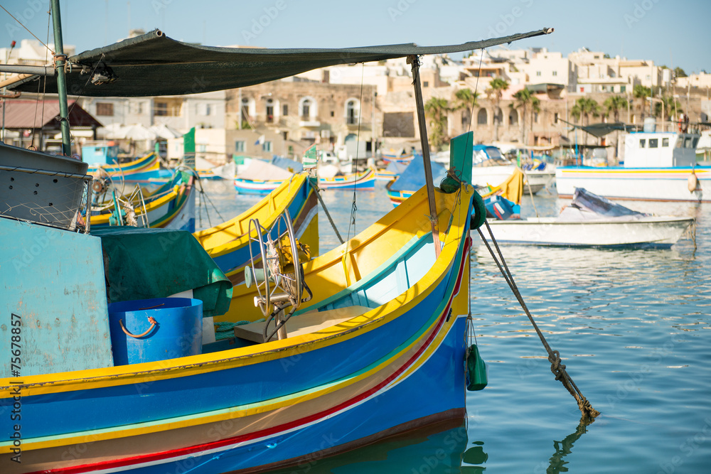 Traditional luzzu boat at Marsaxlokk village, Malta