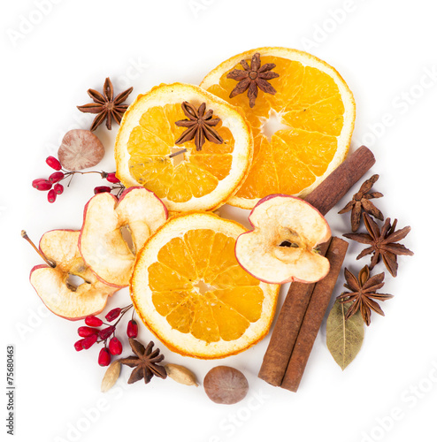 Christmas spices and dried orange sliceson photo