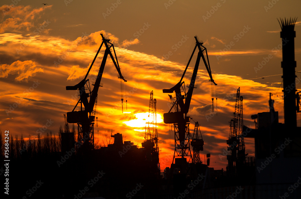 Sunset in the port of Hamburg, Germany Sunset in the port of Hamburg, Germany
