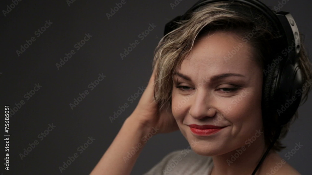 Portrait of beautiful girl in headphones. Relaxation, emotions. Portrait of beautiful girl in headphones. Relaxation, emotions.