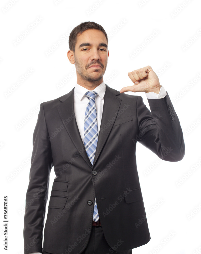 Satisfied businessman pointing Satisfied businessman pointing