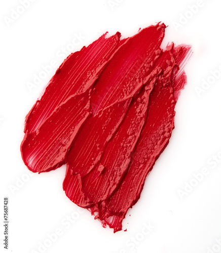 Red colour lipstick stroke on white paper