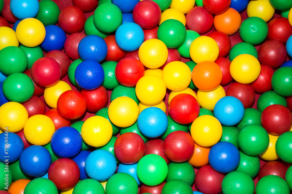 lots of colorful plastic balls in the pool for children lots of colorful plastic balls in the pool for children