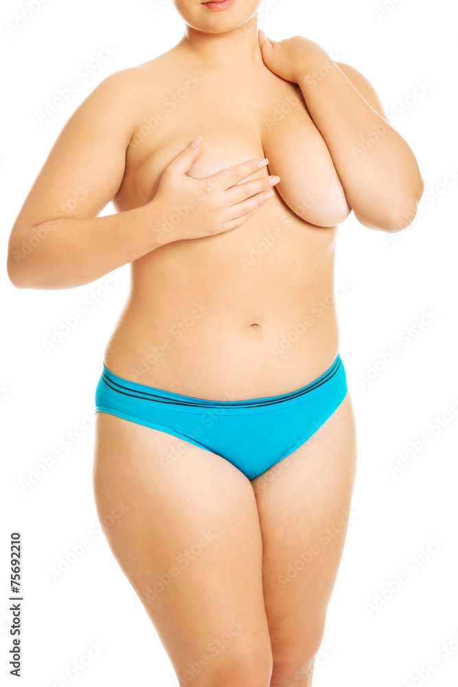 Fototapeta premium Overweight woman covering her breast