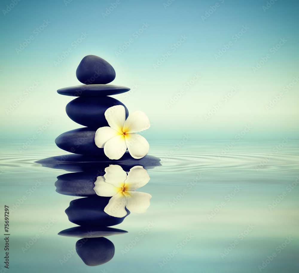 Fototapeta premium Zen stones with frangipani