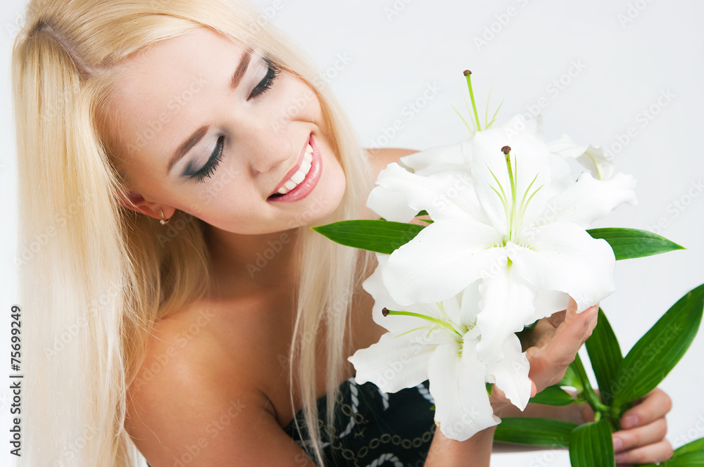 blond girl with a lily