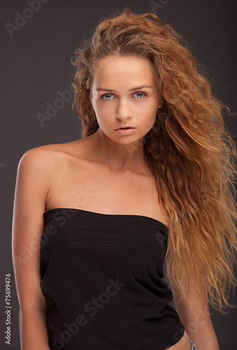 Attractive fashionable young brunette woman.
