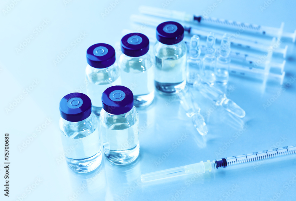 Vaccine in vial with syringe Vaccine in vial with syringe