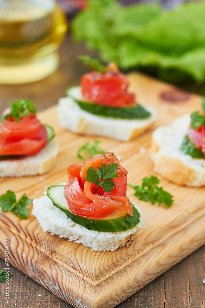 Canapes with smoked salmon and cucumber Canapes with smoked salmon and cucumber