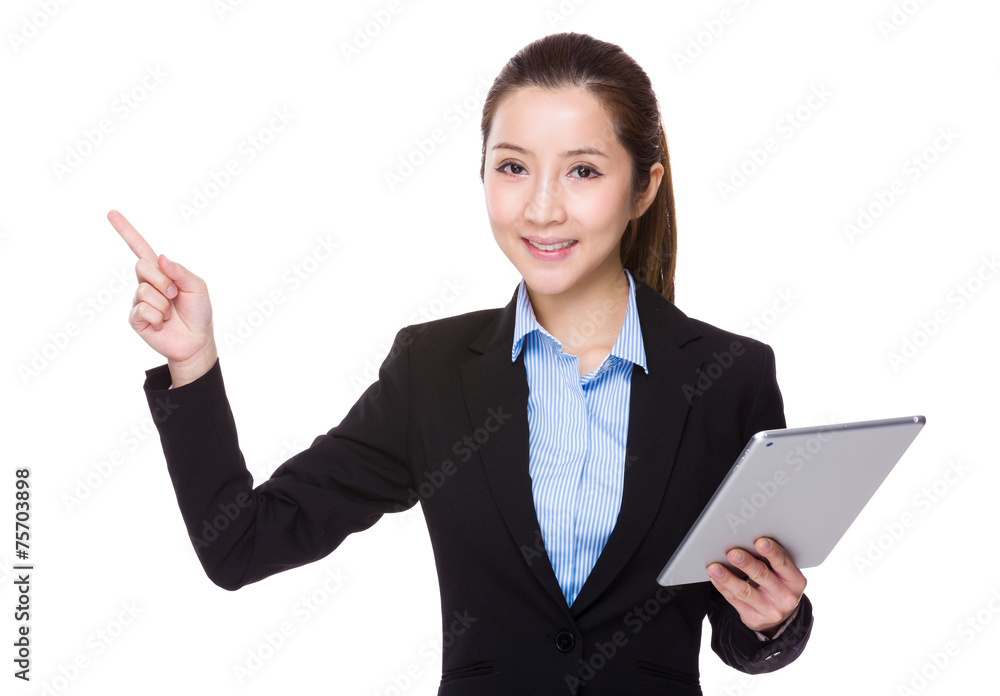 Businesswoman use of tablet and finger point up Businesswoman use of tablet and finger point up
