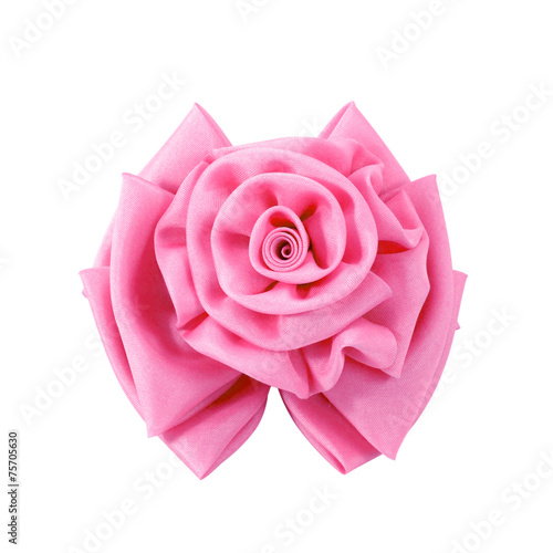 pink fabric flower isolated on a white background.