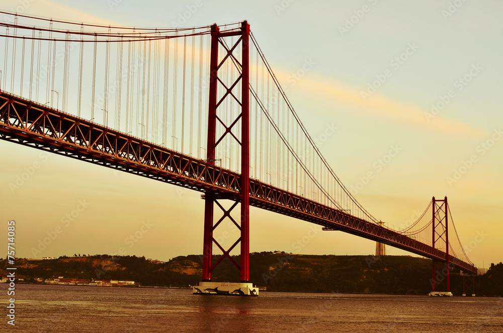 Fototapeta premium 25 de Abril Bridge in Lisbon, Portugal, with a filter effect