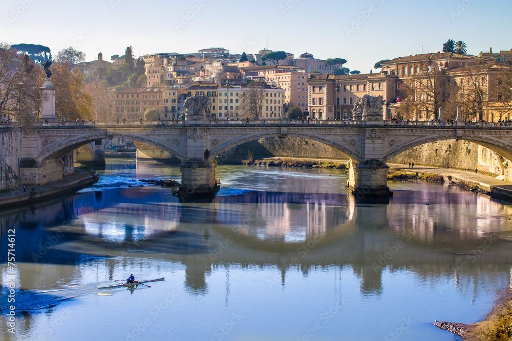 view of a bridge over the Tiber in Rome
