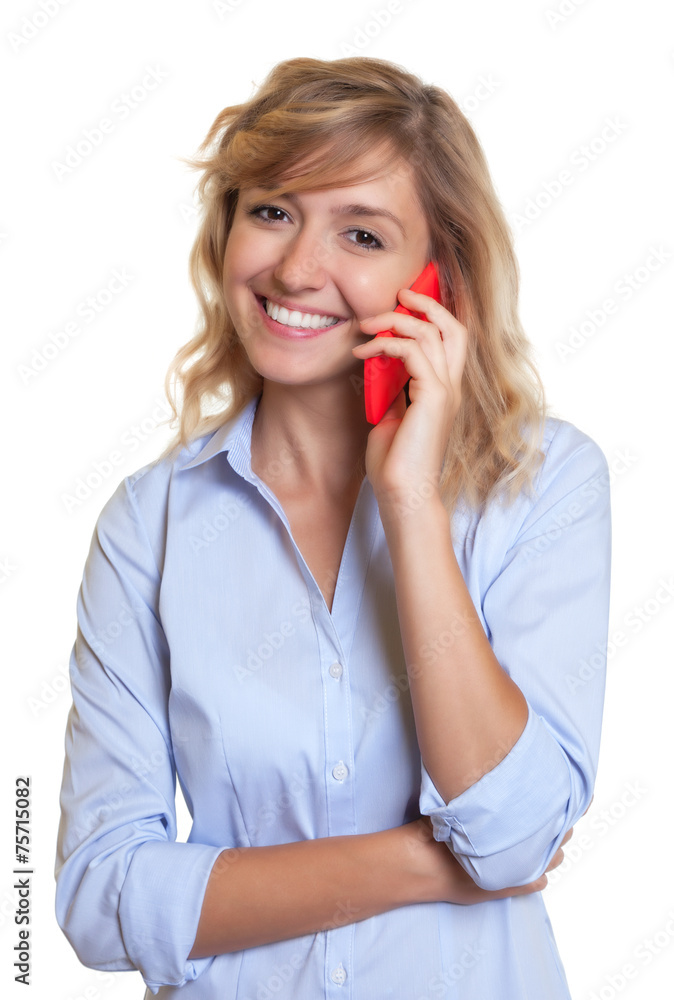 Lachende Frau mit blonden Locken am Telefon Lachende Frau mit blonden Locken am Telefon