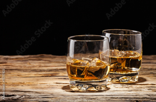 Whiskey drinks on wood