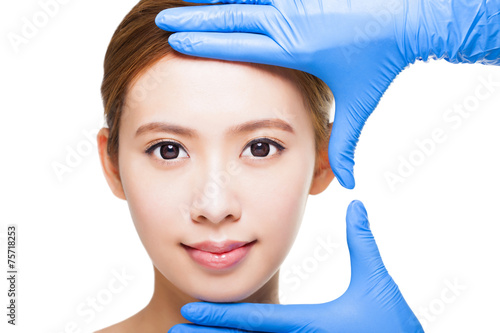 young attractive  woman face and medical beauty concept photo