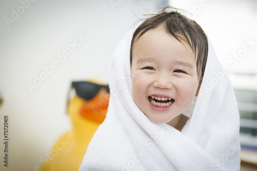 Mixed Race Boy Having Fun a...