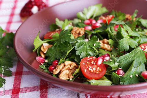 Fresh salad with greens  garnet and spices