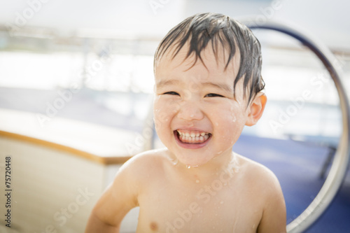Mixed Race Boy Having Fun a...