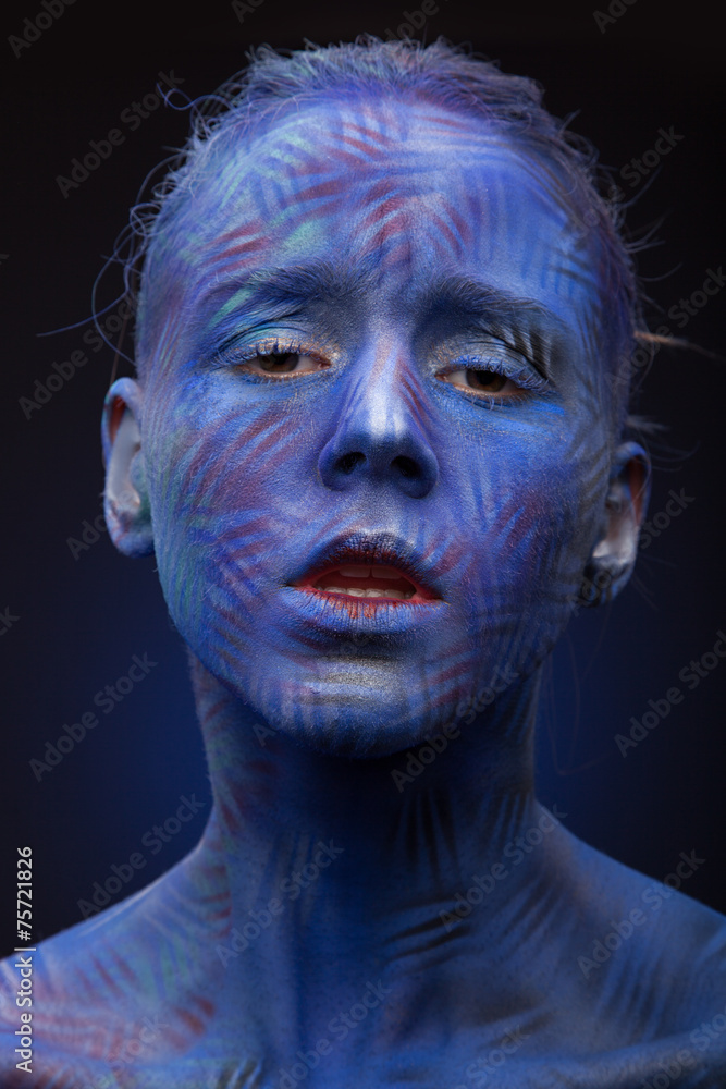 art photo of a beautiful woman with blue face art photo of a beautiful woman with blue face