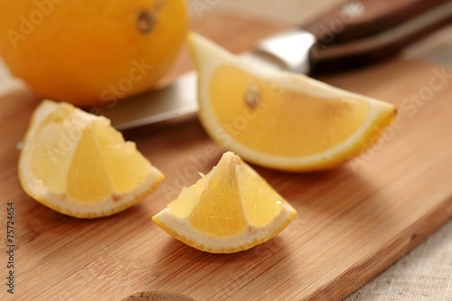 Fresh lemon on a cutting board.